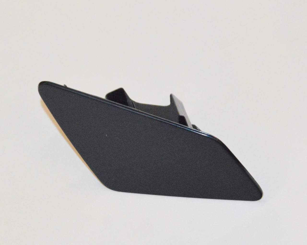 Накладка форсунки омивача фари передньої AND 30955046 ціна, від 4.33 USD